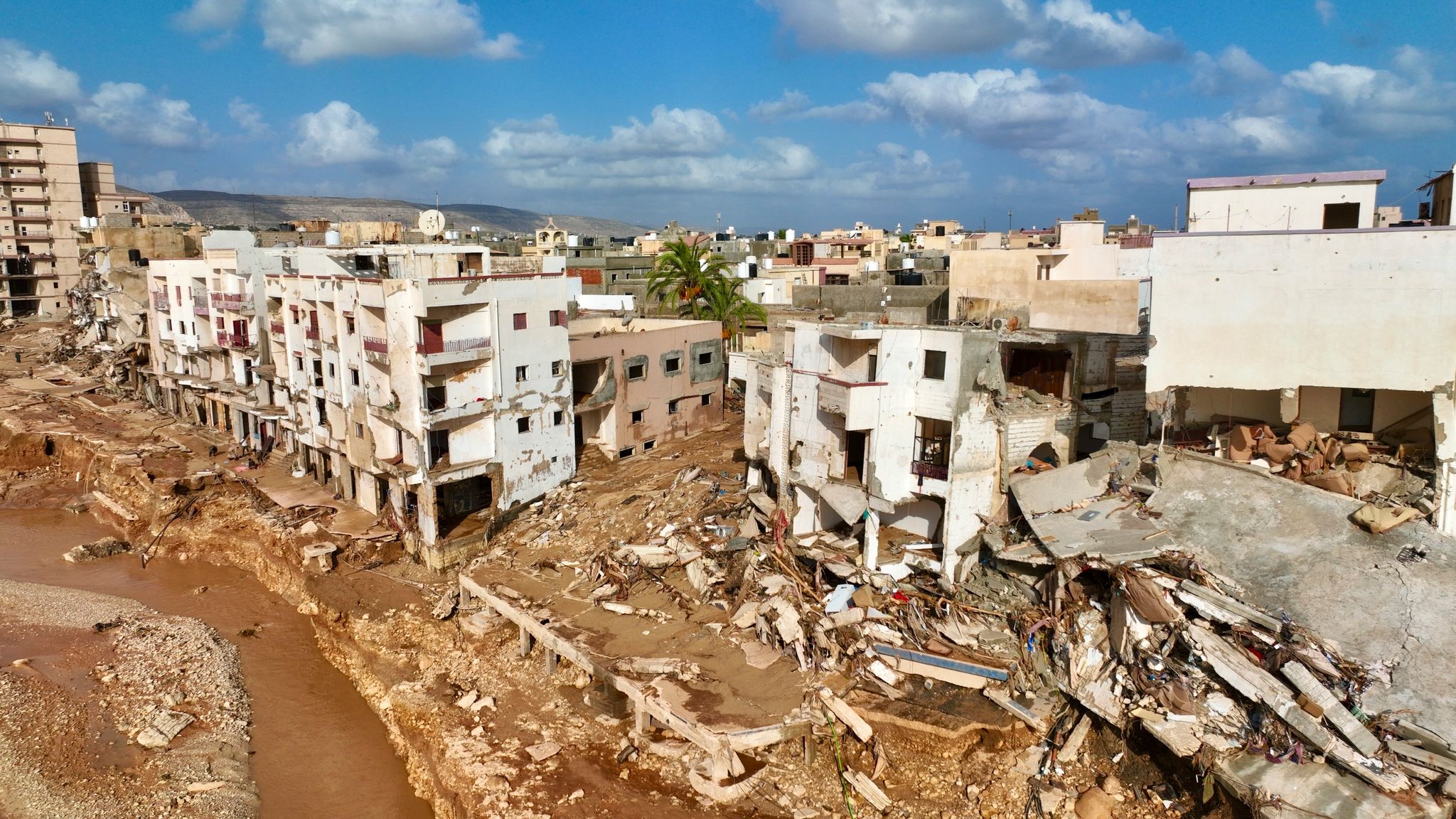 Zerstörte Häuser in der verwüsteten Hafenstadt Darna.